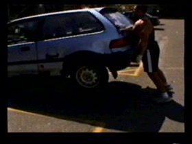 Guy is lifting cars