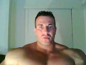 Massive guy flexing